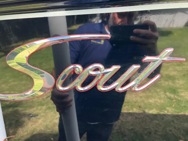 Slide: The Image of 2019 Scout 255LXF logo on boat exterior - 10