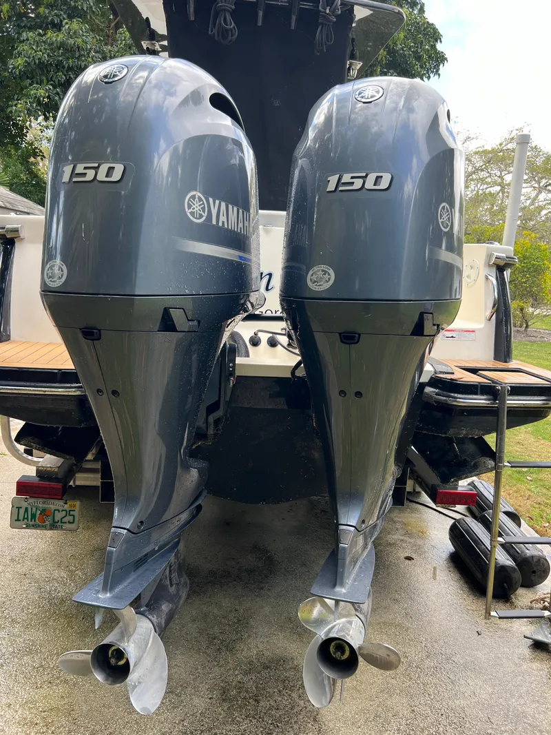 Slide: The Image of 2019 Scout 255LXF with twin Yamaha 150 outboard engines. - 27