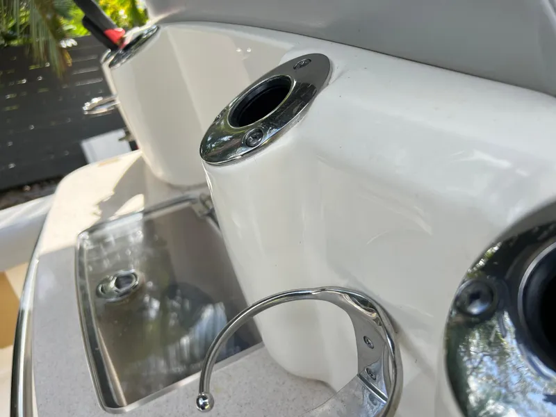 Slide: The Image of 2019 Scout 255LXF boat sink and rod holders. - 35