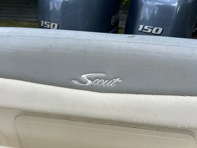 Slide: The Image of 2019 Scout 255LXF boat with twin 150 horsepower engines. - 49