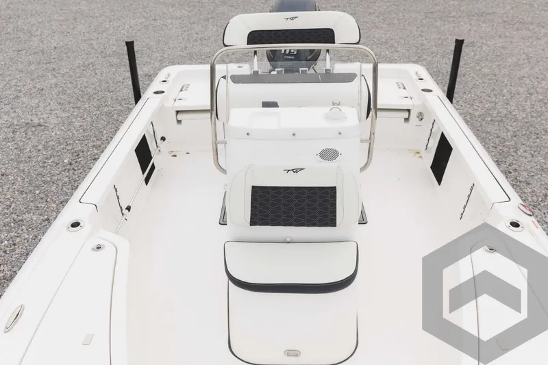 Slide: The Image of 2023 Tidewater 1910 Bay Max boat interior with seating and console. - 15