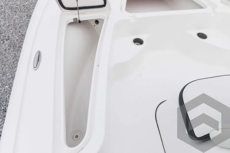 Slide: The Image of 2023 Tidewater 1910 Bay Max boat interior storage compartments. - 19