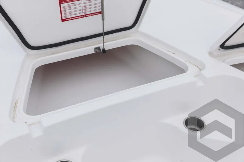 Slide: The Image of Open storage compartment on a 2023 Tidewater 1910 Bay Max boat. - 20