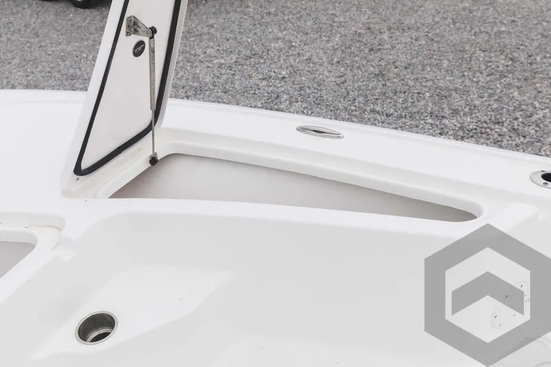 Slide: The Image of 2023 Tidewater 1910 Bay Max boat storage compartment with open hatch. - 21