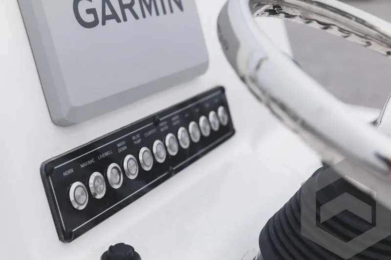 Slide: The Image of Close-up of 2023 Tidewater 1910 Bay Max boat dashboard with Garmin navigation system. - 33