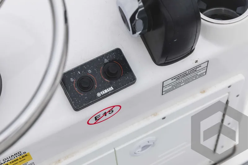 Slide: The Image of Close-up of the control panel on a 2023 Tidewater 1910 Bay Max boat. - 35