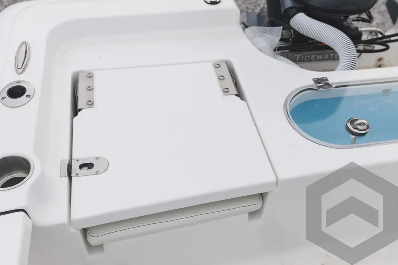 Slide: The Image of 2023 Tidewater 1910 Bay Max boat deck with storage compartment and livewell. - 48