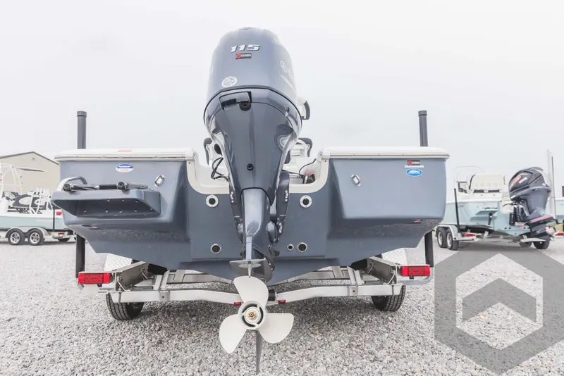 Slide: The Image of 2023 Tidewater 1910 Bay Max boat rear view with outboard motor on trailer. - 7