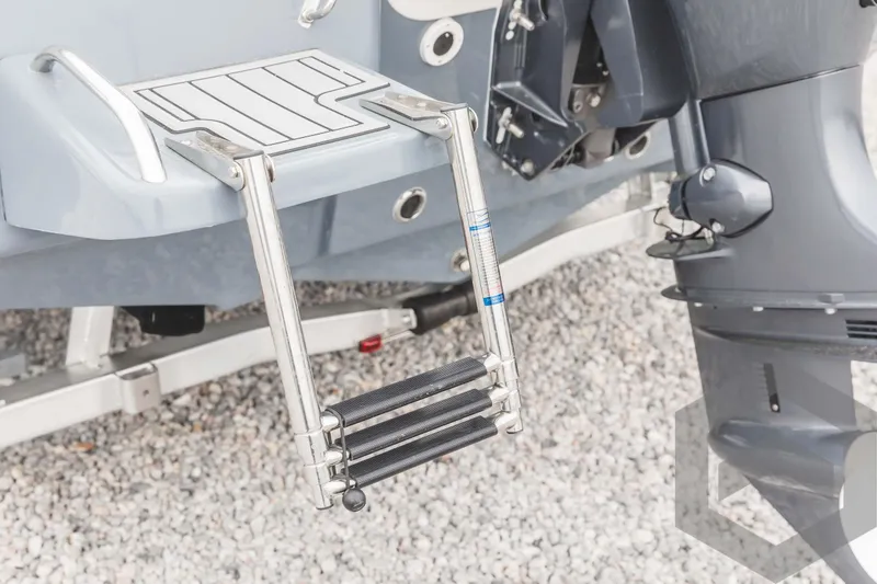 Slide: The Image of 2023 Tidewater 1910 Bay Max boat with a stainless steel boarding ladder. - 8