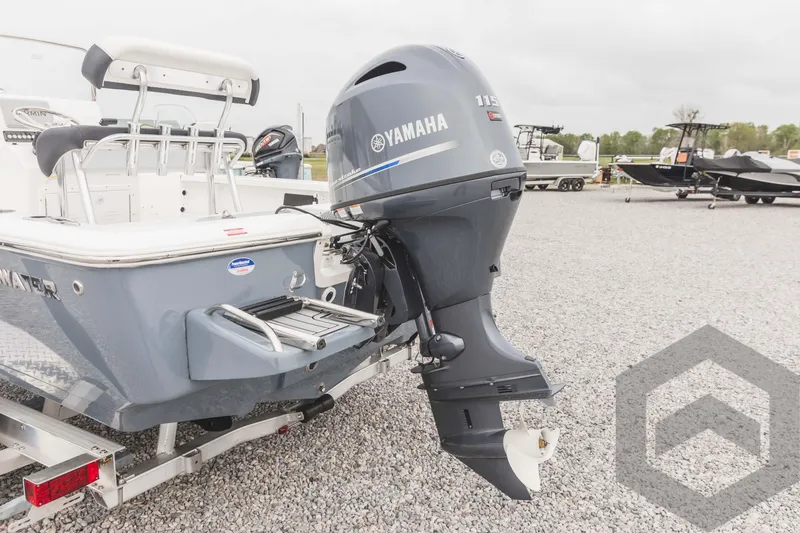 Slide: The Image of 2023 Tidewater 1910 Bay Max boat with Yamaha outboard motor on trailer. - 9