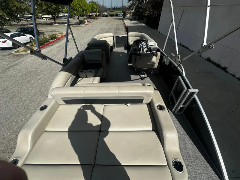 Slide: The Image of 2021 Barletta C22U pontoon boat with spacious seating and modern design. - 19