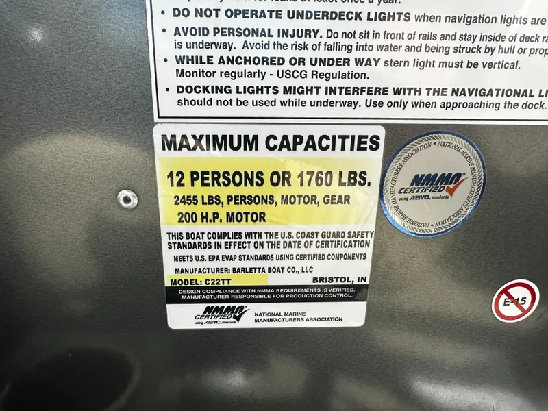 Slide: The Image of 2021 Barletta C22U boat capacity label: 12 persons or 1760 lbs, 200 HP motor. - 22