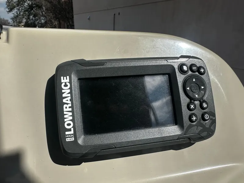 Slide: The Image of Lowrance fish finder on a 2021 Barletta C22U boat. - 24