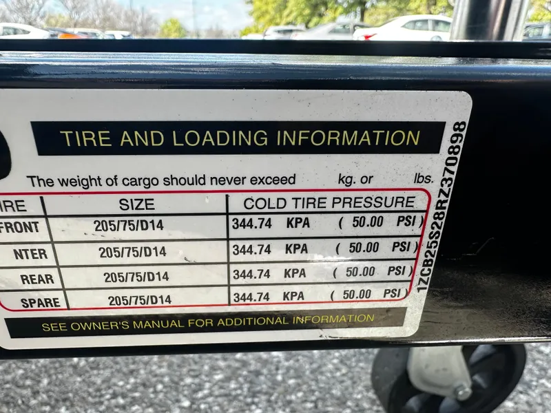 Slide: The Image of Tire and loading information for 2021 Barletta C22U, tire size 205/75/D14, pressure 50 PSI. - 27