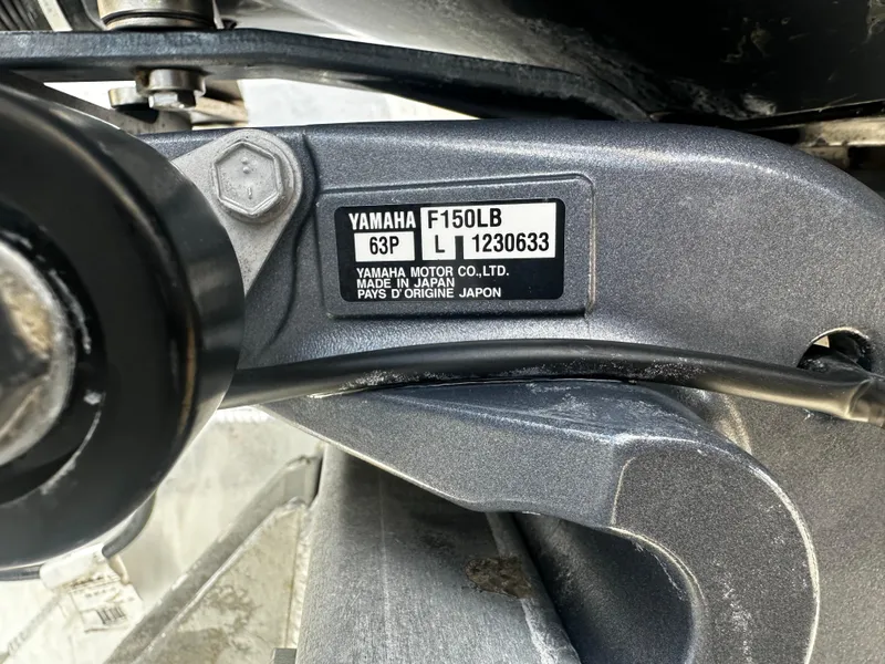 Slide: The Image of Close-up of Yamaha F150LB motor on 2021 Barletta C22U boat. - 29
