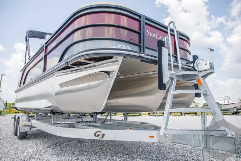 Slide: The Image of 2023 SunCatcher Select 322RC pontoon boat on a trailer. - 10