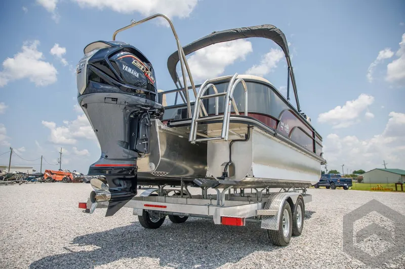 Slide: The Image of 2023 SunCatcher Select 322RC pontoon boat on a trailer with Yamaha outboard motor. - 15
