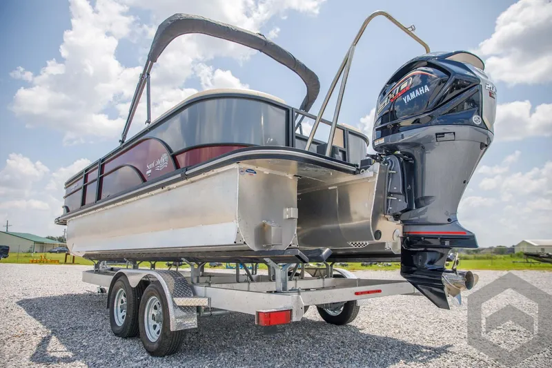 Slide: The Image of 2023 SunCatcher Select 322RC pontoon boat on a trailer with Yamaha outboard motor. - 17