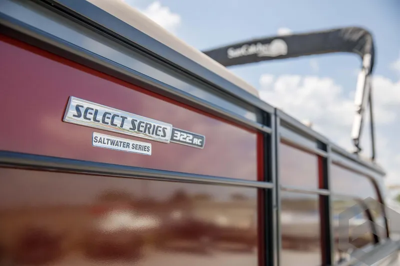 Slide: The Image of 2023 SunCatcher Select 322RC Saltwater Series boat side view with logo. - 19
