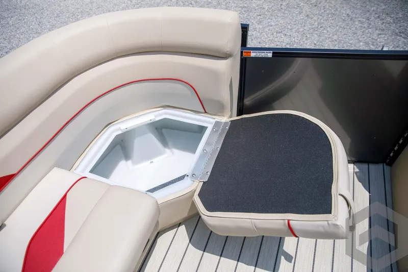 Slide: The Image of SunCatcher Select 322RC 2023 boat seat with storage compartment open. - 27