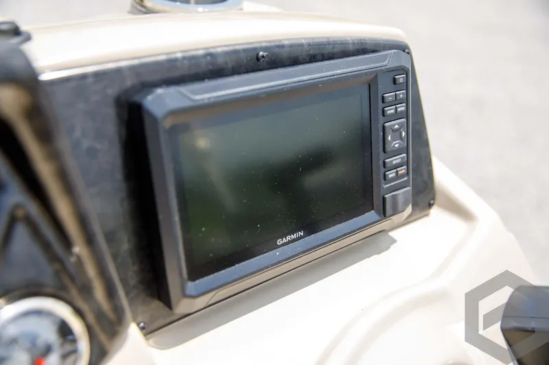 Slide: The Image of 2023 SunCatcher Select 322RC boat dashboard with Garmin navigation system. - 33