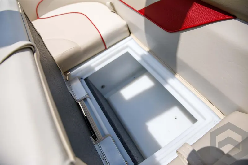 Slide: The Image of 2023 SunCatcher Select 322RC boat storage compartment with cushioned seating. - 39