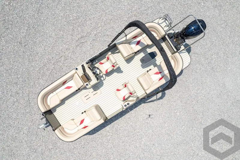 Slide: The Image of 2023 SunCatcher Select 322RC pontoon boat, aerial view, beige seating, outboard motor. - 44