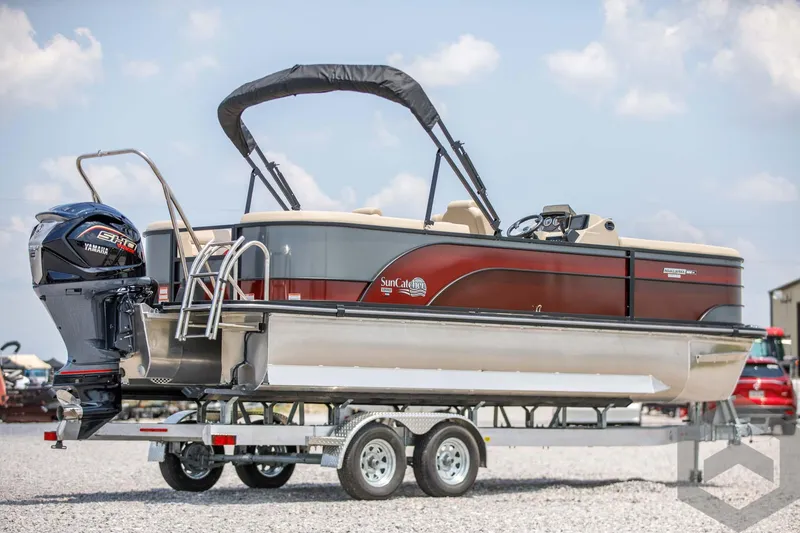 Slide: The Image of 2023 SunCatcher Select 322RC pontoon boat on a trailer. - 6