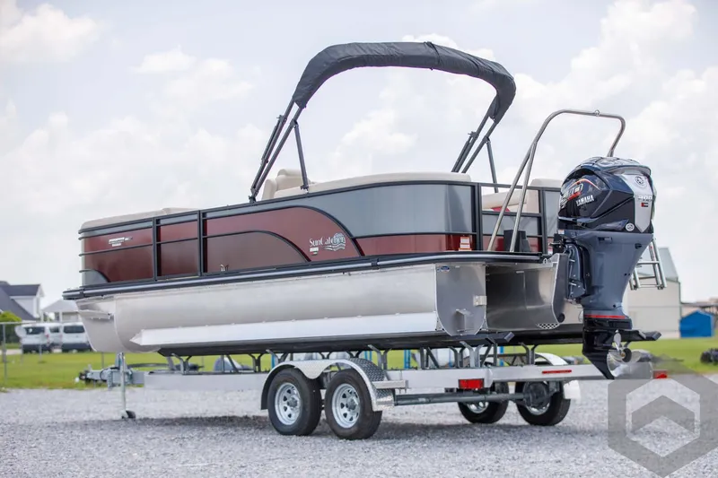 Slide: The Image of 2023 SunCatcher Select 322RC pontoon boat on a trailer with Yamaha outboard motor. - 7