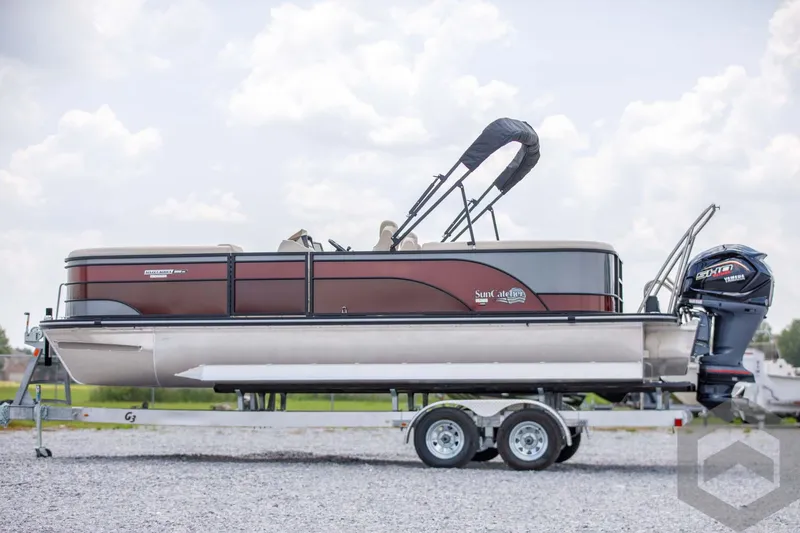 Slide: The Image of 2023 SunCatcher Select 322RC pontoon boat on a trailer, side view. - 8