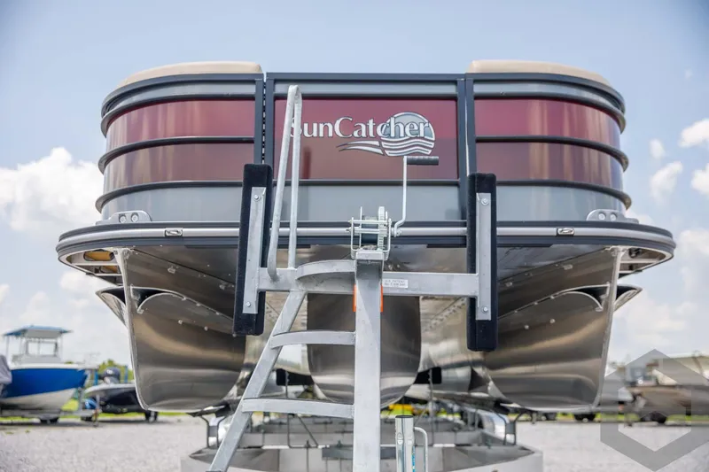 Slide: The Image of 2023 SunCatcher Select 322RC pontoon boat on trailer, front view. - 9