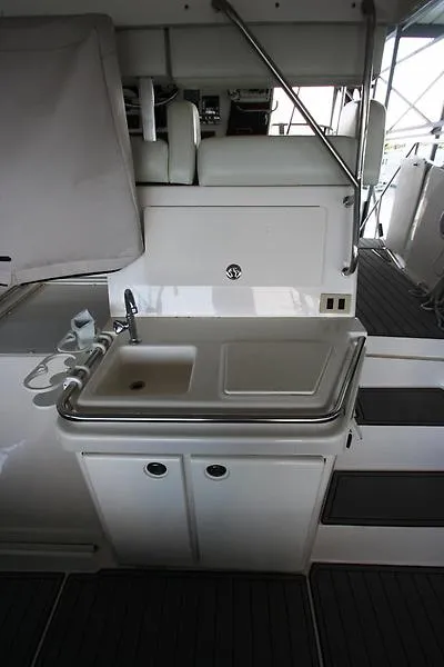 Slide: The Image of 1999 Silverton 392 Motor Yacht interior sink and counter area. - 16