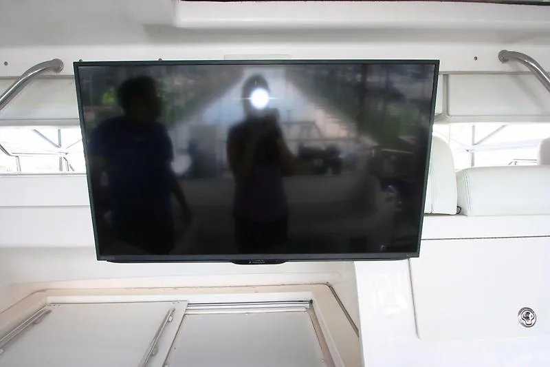 Slide: The Image of Flat-screen TV on 1999 Silverton 392 Motor Yacht interior. - 17