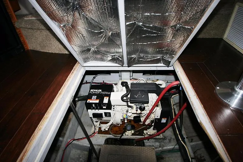 Slide: The Image of Engine compartment of a 1999 Silverton 392 Motor Yacht with Kohler power system. - 27
