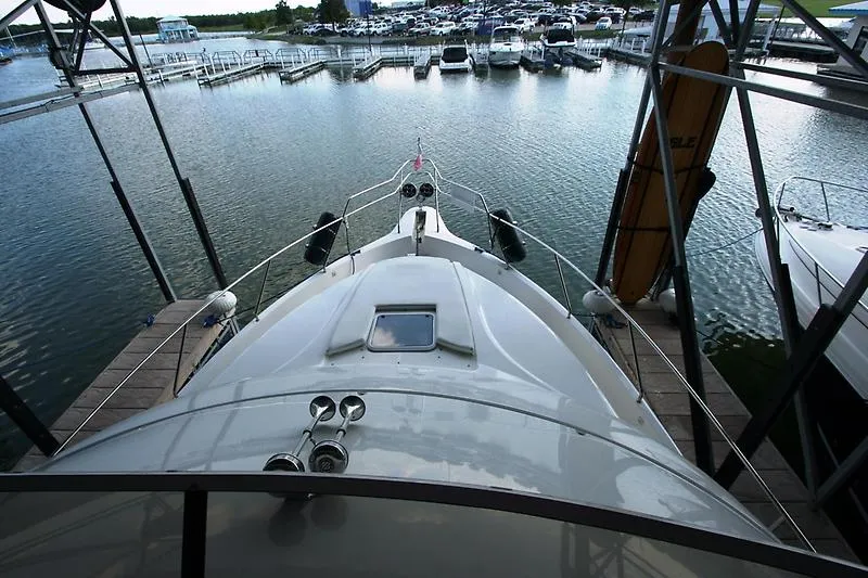 Slide: The Image of 1999 Silverton 392 Motor Yacht docked at marina, aerial view. - 5