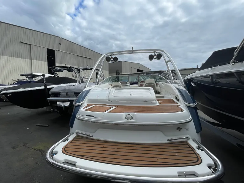 Slide: The Image of Rear view of a 2005 Cobalt 240 boat at the dock. - 7