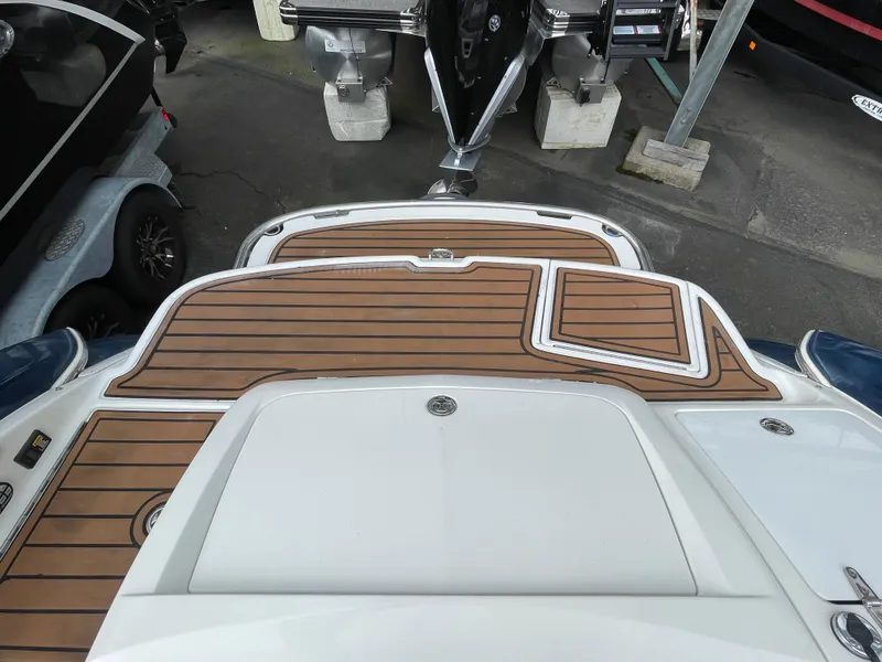 Slide: The Image of Rear view of a 2005 Cobalt 240 boat with wooden deck. - 8