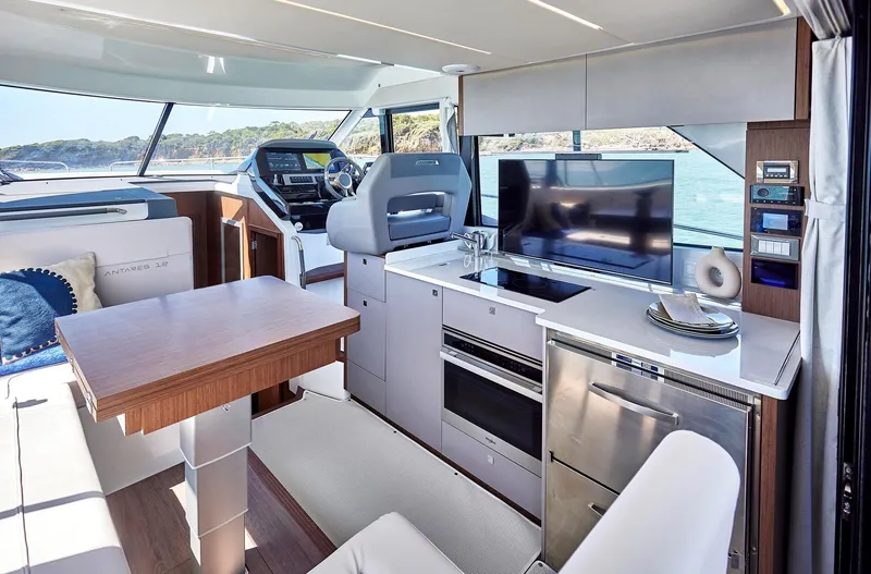 Slide: The Image of Luxurious interior of 2024 Beneteau Antares 12 yacht with modern amenities. - 12