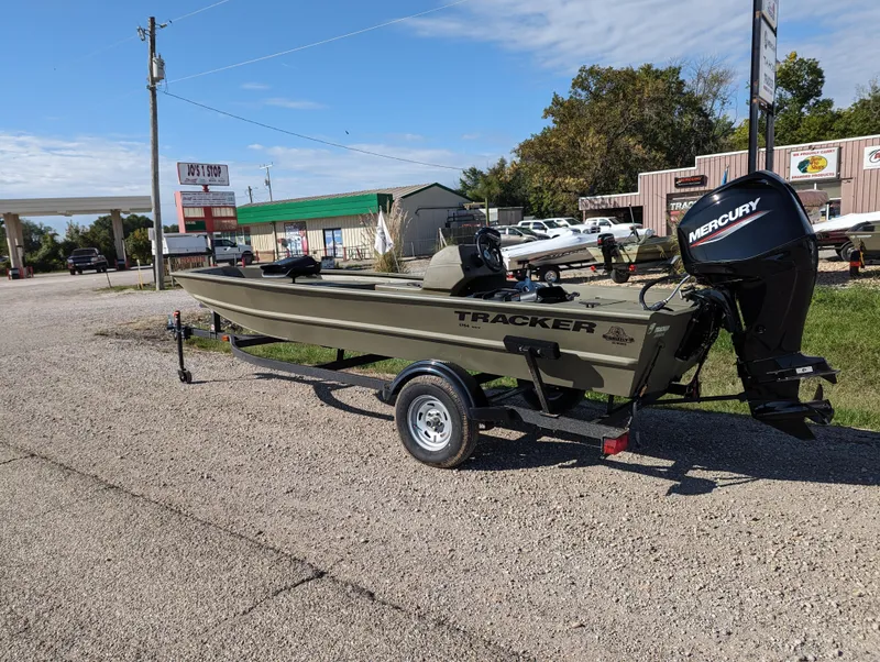 Slide: The Image of 2024 Tracker Grizzly 1754 SC boat with Mercury engine on trailer. - 3