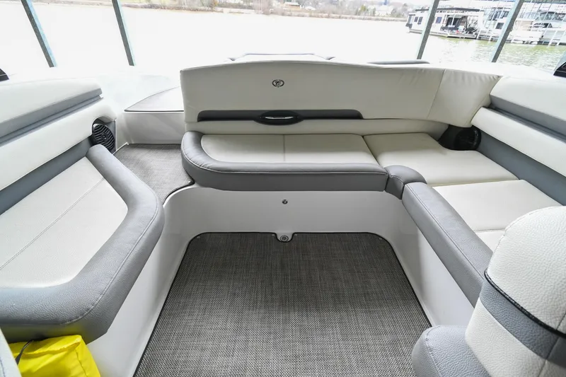 Slide: The Image of 2020 Cobalt CS23 boat interior with spacious seating and modern design. - 16