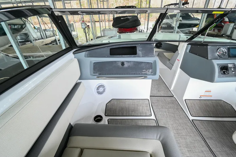 Slide: The Image of Interior of 2020 Cobalt CS23 boat with modern seating and dashboard. - 26