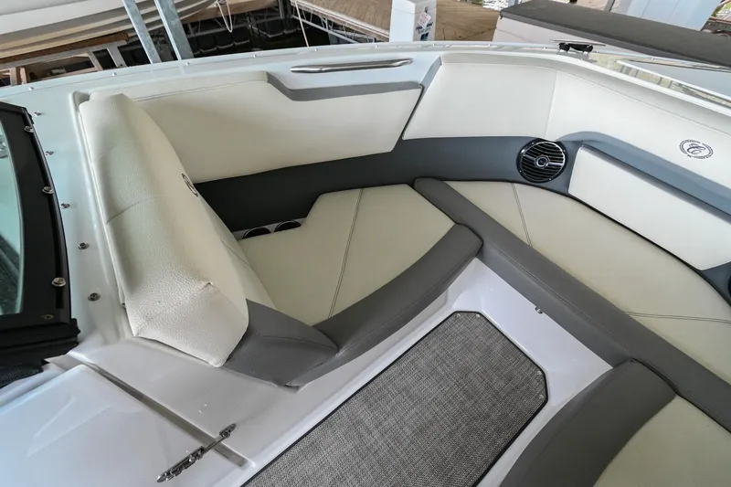 Slide: The Image of 2020 Cobalt CS23 boat interior with cushioned seating and modern design. - 38