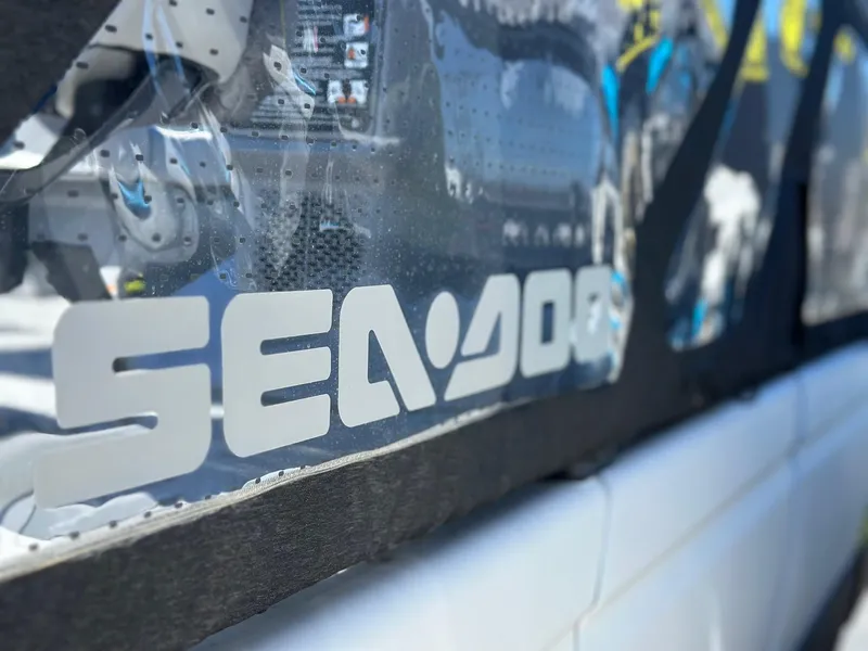 Slide: The Image of Close-up of Sea-Doo SWITCH CRUISE 21FT 230HP logo, 2024 model. - 2