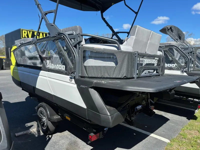 Slide: The Image of 2024 Sea-Doo SWITCH CRUISE 21FT 230HP pontoon boat on trailer in outdoor lot. - 4