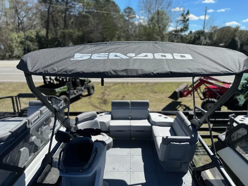 Slide: The Image of 2024 Sea-Doo SWITCH CRUISE 21FT 230HP pontoon boat with canopy and seating. - 5
