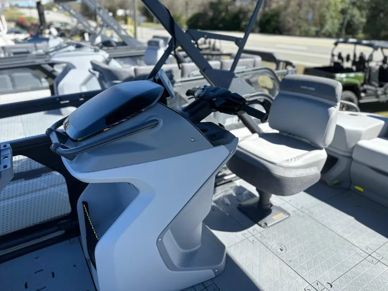 Slide: The Image of 2024 Sea-Doo SWITCH CRUISE 21FT 230HP boat interior with steering console and seating. - 6