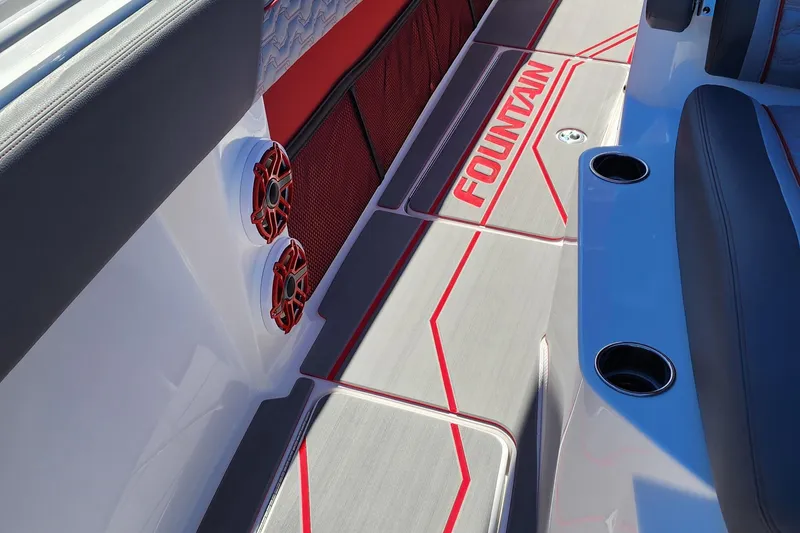 Slide: The Image of 2024 Fountain 38 SC boat interior with custom flooring and speakers. - 21