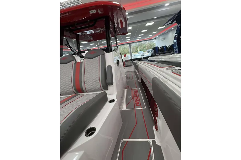 Slide: The Image of 2024 Fountain 38 SC boat interior with sleek seating and modern design. - 31