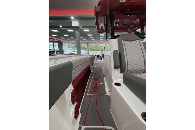 Slide: The Image of 2024 Fountain 38 SC boat interior with sleek seating and modern design. - 32