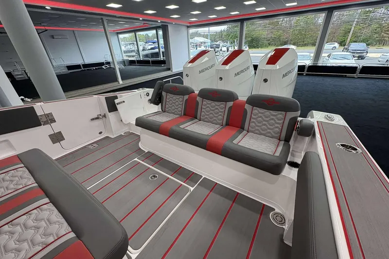 Slide: The Image of 2024 Fountain 38 SC boat interior with stylish seating and Mercury engines. - 41